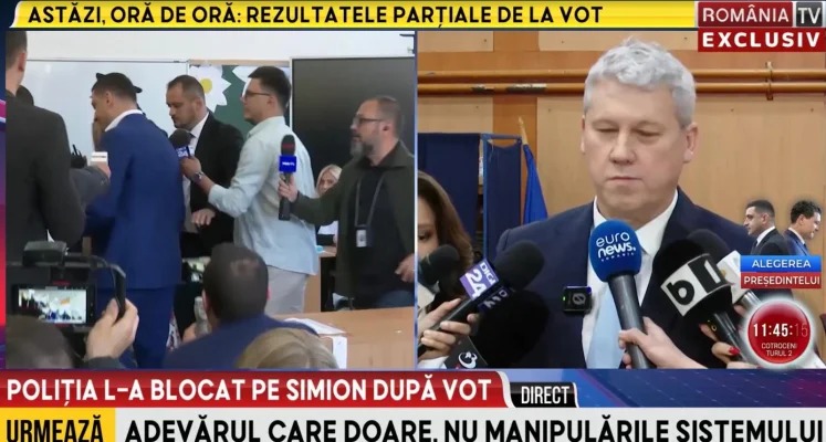 În timp ce Cătălin Predoiu dădea declarații de presă lângă urne, Simion și Georgescu au fost SCOȘI cu Poliția din secția de vot