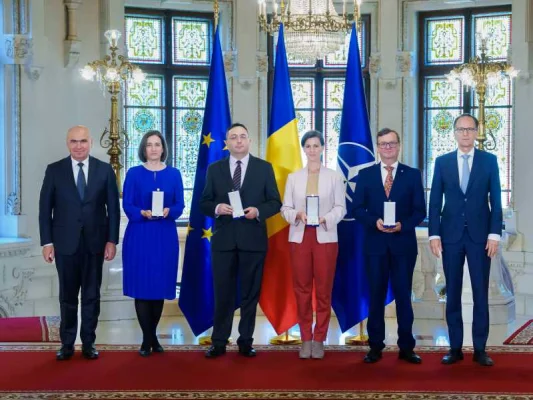 Patru fundații germane, decorate de președintele interimar Ilie Bolojan