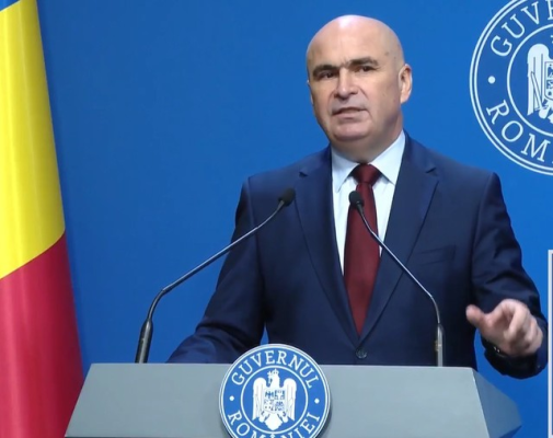 Bolojan: Primul pachet de măsuri, adoptat prin asumarea răspunderii / Vom reaşeza TVA la două cote, de 11% şi de 21%. Cota redusă, la medicamente, apa, lemne, energie termică, HORECA / Creşterea accizelor cu 10%, la combustibili, ţigări şi alcool