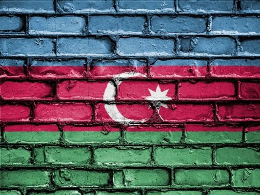 Tensiuni în relaţiile dintre Azerbaidjan şi Rusia: Poliția a făcut percheziții la sediul Sputnik din Baku / Doi presupuşi agenţi ai serviciilor de informaţii ruse, care ar fi activat sub acoperire, ca jurnaliști, au fost arestați (presa azeră)